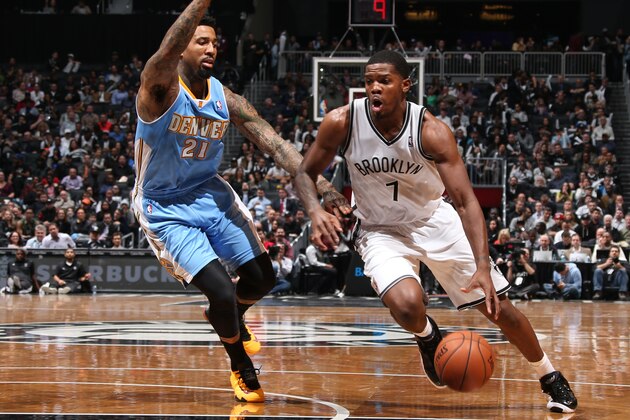NEW YORK, NY - DECEMBER 3: Joe Johnson #7 of the Brooklyn Nets drives against Wilson Chandler #21 of the Denver Nuggets during a game at Barclays Center on December 3, 2013 in the Brooklyn borough of New York City.  NOTE TO USER: User expressly acknowledges and agrees that, by downloading and/or using this Photograph, user is consenting to the terms and conditions of the Getty Images License Agreement. Mandatory Copyright Notice: Copyright 2013 NBAE (Photo by Nathaniel S. Butler/NBAE via Getty Images)