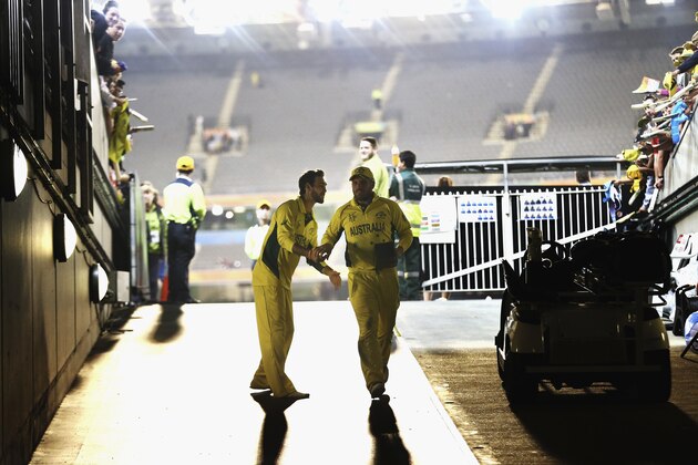 MELBOURNE, AUSTRALIA - FEBRUARY 14:  Aaron Finch of Australia is congratulated by Glenn Maxwell of Australia after collecting his player of the match award during the 2015 ICC Cricket World Cup match between England and Australia at Melbourne Cricket Ground on February 14, 2015 in Melbourne, Australia.  (Photo by Ryan Pierse/Getty Images)