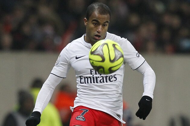 PSG's Lucas controls the ball during his French League one soccer match against PSG at the Lille Metropole stadium, in Villeneuve d'Ascq, northern France, Wednesday, Dec. 3, 2014. (AP Photo/Michel Spingler)