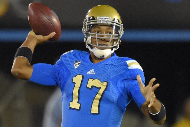 UCLA quarterback Brett Hundley passes during the first half of an NCAA college football game against Southern California, Saturday, Nov. 22, 2014, in Pasadena, Calif. (AP Photo/Mark J. Terrill)