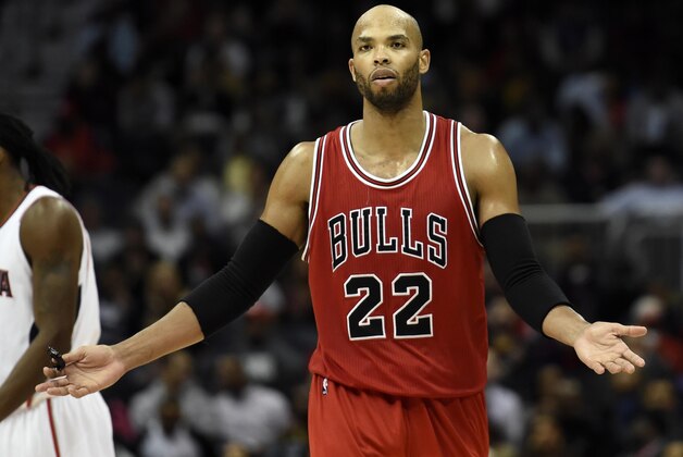 Dec 15, 2014; Atlanta, GA, USA; Chicago Bulls forward Taj Gibson (22) reacts to being called for traveling against the Atlanta Hawks during the second half at Philips Arena. The Hawks defeated the Bulls 93-86. Mandatory Credit: Dale Zanine-USA TODAY Sports