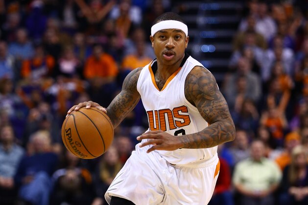 Dec 23, 2014; Phoenix, AZ, USA; Phoenix Suns guard Isaiah Thomas (3) against the Dallas Mavericks at US Airways Center. The Suns defeated the Mavericks 124-115. Mandatory Credit: Mark J. Rebilas-USA TODAY Sports
