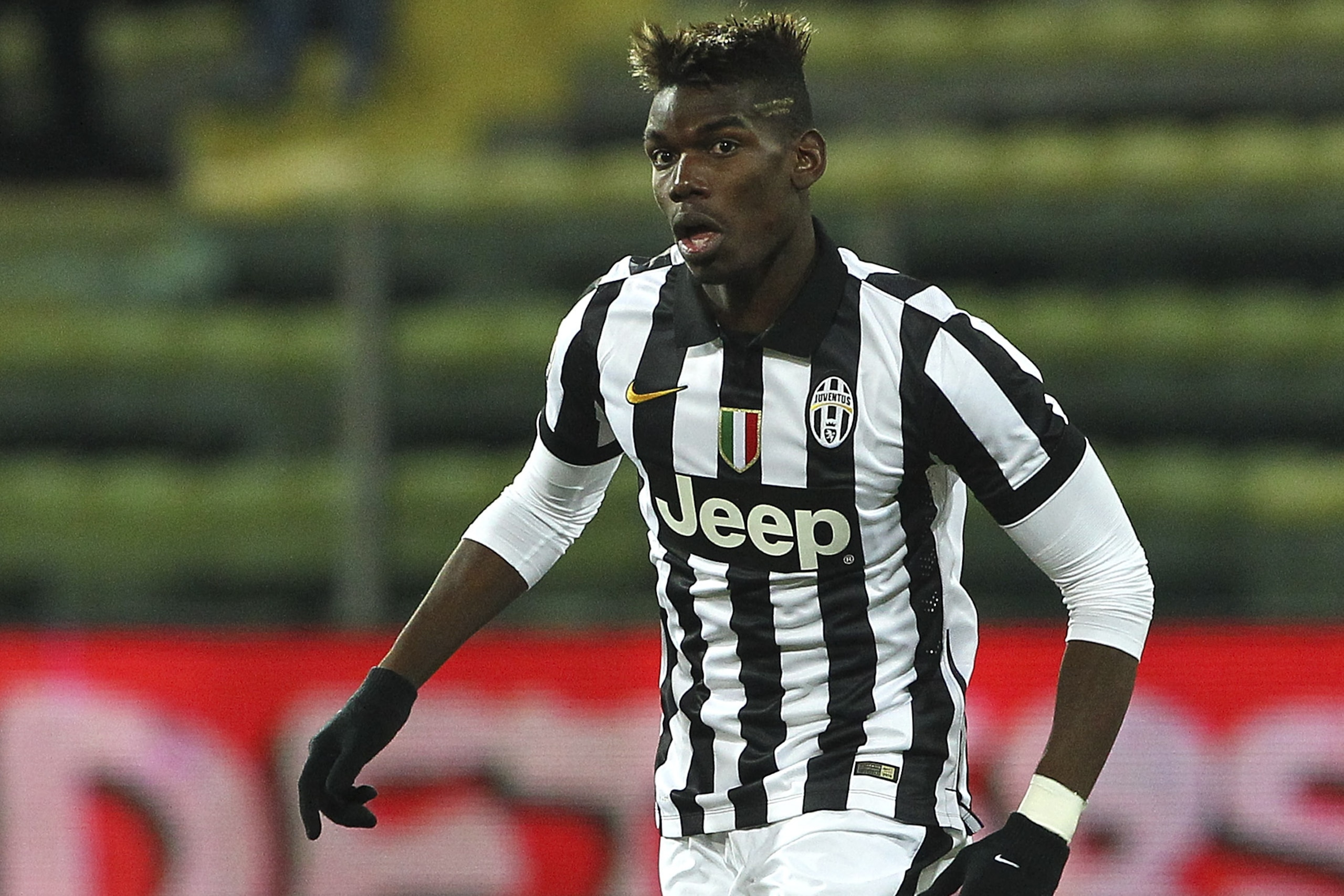 PARMA, ITALY - JANUARY 28:  Paul Pogba of Juventus FC in action during the TIM Cup match between Parma FC and Juventus FC at Stadio Ennio Tardini on January 28, 2015 in Parma, Italy.  (Photo by Marco Luzzani/Getty Images)
