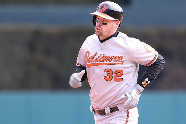 DETROIT, MI - APRIL 06: Matt Wieters #32 of the Baltimore Orioles rounds second base after hitting a ninth inning solo home run to left field during the game against the Detroit Tigers at Comerica Park on April 6, 2014 in Detroit, Michigan. The Orioles defeated the Tigers 3-1. (Photo by Leon Halip/Getty Images)
