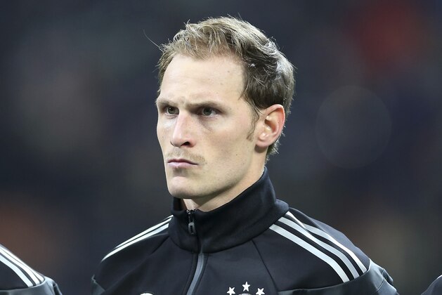 Germany defender Benedikt Howedes stands prior to the start of a friendly soccer match between Italy and Germany at the San Siro  stadium in Milan, Italy, Friday, Nov. 15, 2013. (AP Photo/Antonio Calanni)