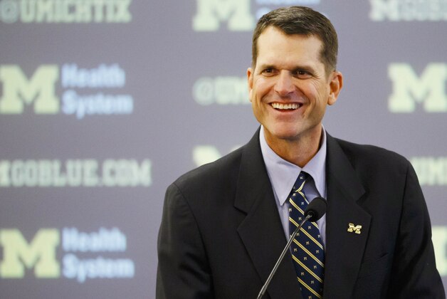 Dec 30, 2014; Ann Arbor, MI, USA; Jim Harbaugh speaks to the media as he is introduced as the new head football coach of the Michigan Wolverines at Jonge Center. Mandatory Credit: Rick Osentoski-USA TODAY Sports