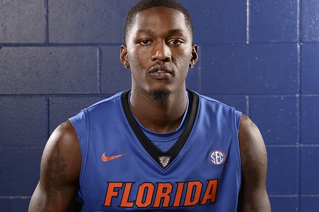 University of Florida's Dorian Finney-Smith (10) poses for 2014-2015 basketball season photos during Media Day in Gainesville, Fla., Wednesday, Oct., 15, 2014.  (AP Photo/Phil Sandlin)