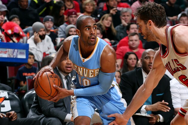 CHICAGO, IL - JANUARY 1: Arron Afflalo #10 of the Denver Nuggets handles the ball against the Chicago Bulls on January 1, 2015 at the United Center in Chicago, Illinois. NOTE TO USER: User expressly acknowledges and agrees that, by downloading and or using this Photograph, user is consenting to the terms and conditions of the Getty Images License Agreement. Mandatory Copyright Notice: Copyright 2015 NBAE (Photo by Gary Dineen/NBAE via Getty Images)
