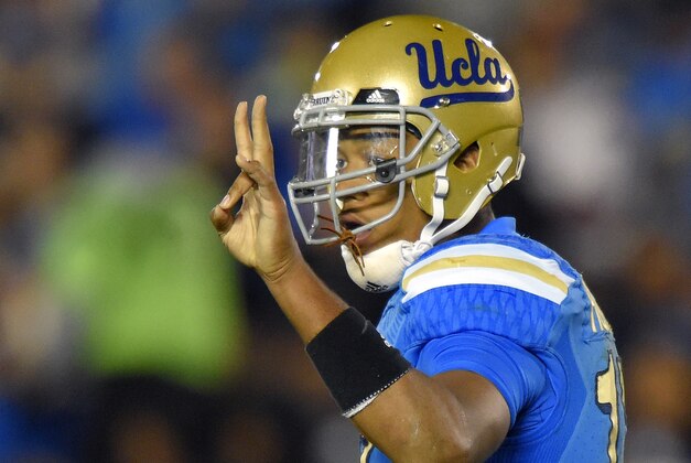 UCLA quarterback Brett Hundley gestures during the second half of an NCAA college football game against Southern California, Saturday, Nov. 22, 2014, in Pasadena, Calif. UCLA won 38-20. (AP Photo/Mark J. Terrill)