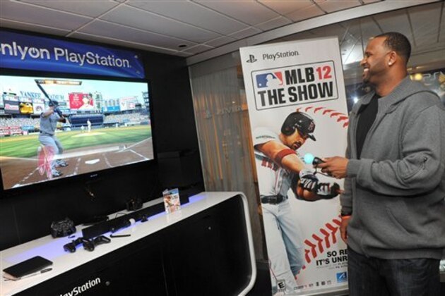 COMMERCIAL IMAGE - In this photo taken by AP Images for PlayStation, New York Yankees pitcher CC Sabathia plays MLB 12 The Show during a PlayStation preview event, Thursday, Feb. 16, 2012, in New York.  MLB 12 The Show will be available on March 6, 2012 for PlayStation 3 and PlayStation Vita.  (Diane Bondareff/AP Images for PlayStation)