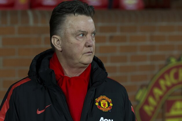 Manchester United's manager Louis van Gaal takes to the touchline before the English Premier League soccer match between Manchester United and Burnley at Old Trafford Stadium, Manchester, England, Wednesday Feb. 11, 2015. (AP Photo/Jon Super)