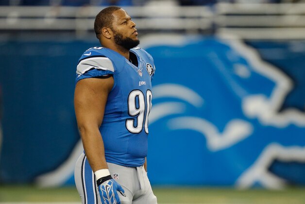 DETROIT, MI - DECEMBER 14: Ndamukong Suh #90 of the Detroit Lions participates in pre game warm ups prior to the game against the Minnesota Vikings at Ford Field on December 14, 2014 in Detroit, Michigan. (Photo by Gregory Shamus/Getty Images)