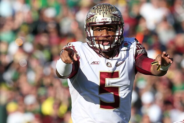 PASADENA, CA - JANUARY 01:  Quarterback Jameis Winston #5 of the Florida State Seminoles signals to his team against the Oregon Ducks in the first quarter of the College Football Playoff Semifinal at the Rose Bowl Game presented by Northwestern Mutual at the Rose Bowl on January 1, 2015 in Pasadena, California.  (Photo by Stephen Dunn/Getty Images)
