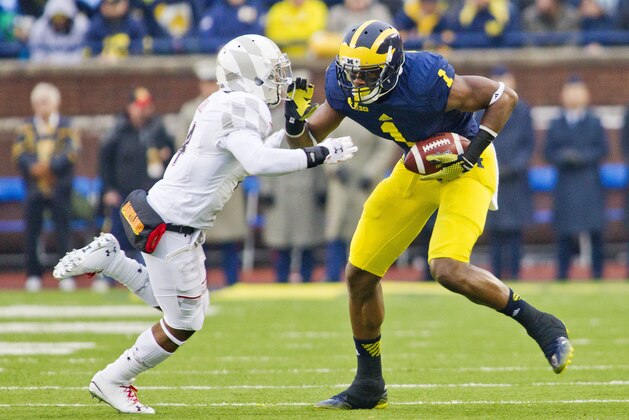 Maryland defensive back William Likely, left, defends a reception by Michigan wide receiver Devin Funchess (1) in the first quarter of an NCAA college football game in Ann Arbor, Mich., Saturday, Nov. 22, 2014. (AP Photo/Tony Ding)