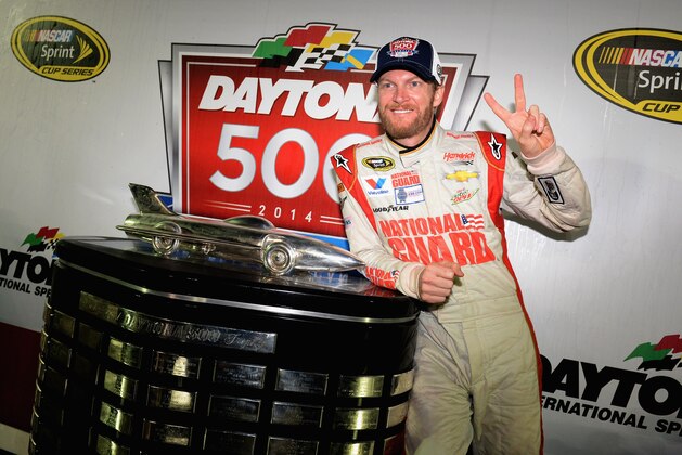 DAYTONA BEACH, FL - FEBRUARY 23:  Dale Earnhardt Jr., driver of the #88 National Guard Chevrolet, celebrates in Victory Lane with the the Harley J. Earl trophy after winning the NASCAR Sprint Cup Series Daytona 500 at Daytona International Speedway on February 23, 2014 in Daytona Beach, Florida.  (Photo by Patrick Smith/Getty Images)