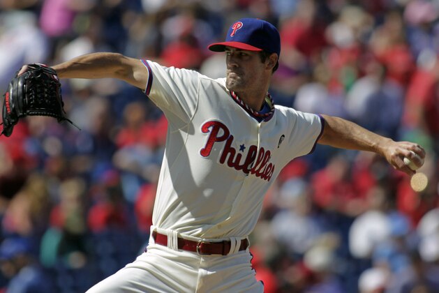 Philadelphia Phillies starting pitcher Cole Hamels throws against the Atlanta Braves in the first inning of a baseball game Sunday, Sept. 28, 2014, in Philadelphia. (AP Photo/H. Rumph Jr)