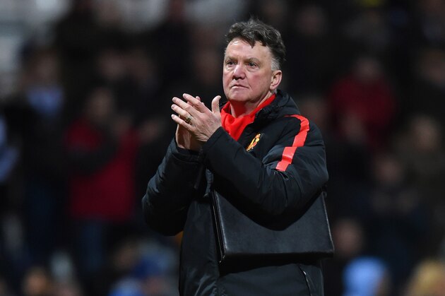 PRESTON, ENGLAND - FEBRUARY 16:  Manager Louis van Gaal of Manchester United applauds the fans during the FA Cup Fifth round match between Preston North End and Manchester United at Deepdale on February 16, 2015 in Preston, England  (Photo by Michael Regan/Getty Images)