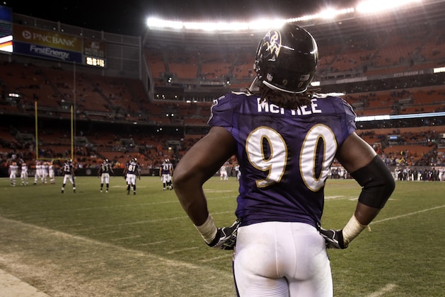 Baltimore Ravens defensive end Pernell McPhee watches the play on the field late in the fourth quarter against the Cleveland Browns in an NFL football game on Sunday, Dec. 4, 2011, in Cleveland.  The Ravens would win the game 24-10.   (AP Photo/Amy Sancetta)