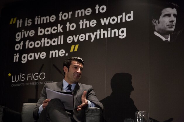 Luis Figo speaks to the media as he launches his FIFA Presidential Campaign Manifesto, at Wembley Stadium, London, Thursday, Feb. 19, 2015. The 2001 FIFA world player of the year launched his manifesto on Thursday at Wembley and spoke about his plan to restore the credibility and rebuild trust in football’s world governing body, as he tries to unseat Sepp Blatter, who is seeking a fifth, four-year term as president.  (AP Photo/Matt Dunham)