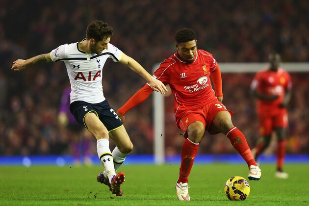 LIVERPOOL, ENGLAND - FEBRUARY 10:  Jordon Ibe of Liverpool takes on Ryan Mason of Tottenham Hotspur during the Barclays Premier League match between Liverpool and Tottenham Hotspur at Anfield on February 10, 2015 in Liverpool, England.  (Photo by Clive Brunskill/Getty Images)