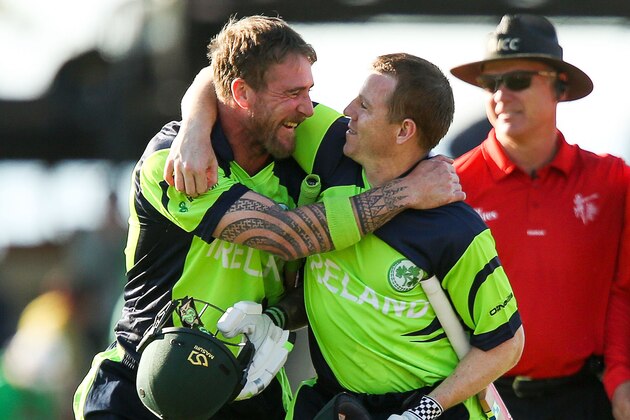NELSON, NEW ZEALAND - FEBRUARY 16:  John Mooney (L) and Niall O'Brien of Ireland celebrate after winning the 2015 ICC Cricket World Cup match between the West Indies and Ireland at Saxton Field on February 16, 2015 in Nelson, New Zealand.  (Photo by Hagen Hopkins/Getty Images)