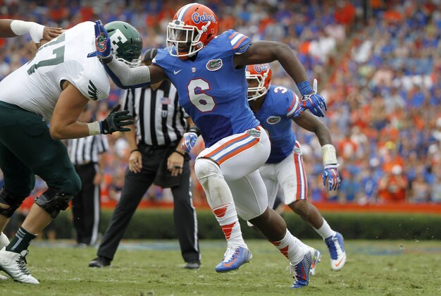Sep 6, 2014; Gainesville, FL, USA; Florida Gators defensive lineman Dante Fowler Jr. (6) rushes during the second half against the Eastern Michigan Eagles at Ben Hill Griffin Stadium. Florida Gators defeated the Eastern Michigan Eagles 65-0. Mandatory Credit: Kim Klement-USA TODAY Sports