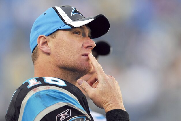 CHARLOTTE, NC - DECEMBER 17:  Quarterback Chris Weinke #16 of the Carolina Panthers watches after being removed from a game against the Pittsburgh Steelers on December 17, 2006 at Bank of America Stadium in Charlotte, North Carolina. The Steelers defeated the Panthers 37-3.  (Photo by Grant Halverson/Getty Images)