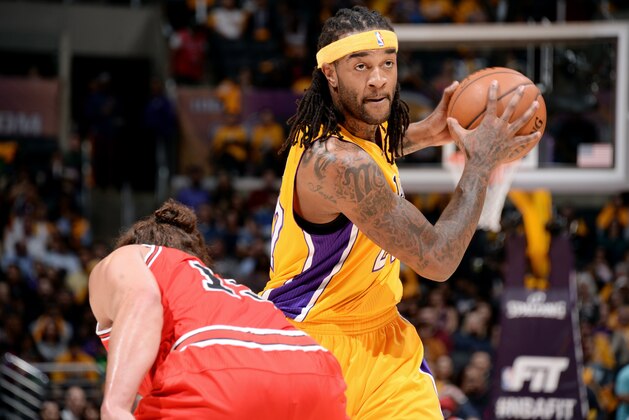 LOS ANGELES, CA - JANUARY 29: Jordan Hill #27 of the Los Angeles Lakers handles the ball against the Chicago Bulls at STAPLES Center on January 29, 2015 in Los Angeles, California. NOTE TO USER: User expressly acknowledges and agrees that, by downloading and/or using this Photograph, user is consenting to the terms and conditions of the Getty Images License Agreement. Mandatory Copyright Notice: Copyright 2015 NBAE (Photo by Andrew D. Bernstein/NBAE via Getty Images)