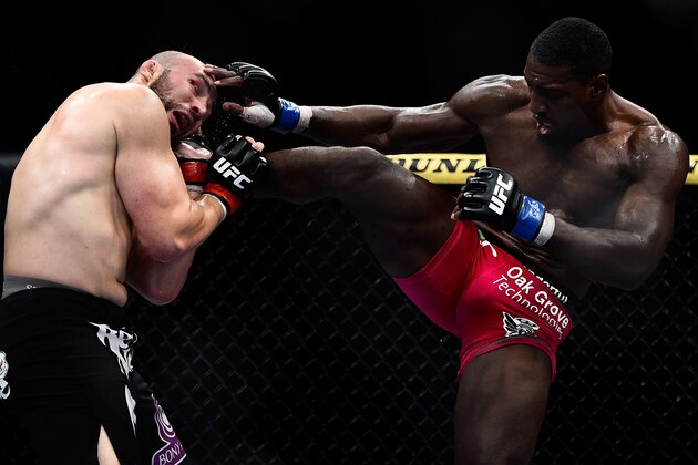 RIO DE JANEIRO, BRAZIL - OCTOBER 25:  Phil Davis of the United States kicks Glover Teixeira of Brazil in their light heavyweight bout during the UFC 179 event at Maracanazinho on October 25, 2014 in Rio de Janeiro, Brazil.  (Photo by Buda Mendes/Getty Images)
