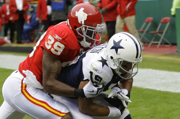 Kansas City Chiefs cornerback Brandon Carr (39) breaks up a pass to Dallas Cowboys wide receiver Miles Austin (19) during the first half of an NFL football game between the Dallas Cowboys and Kansas City Chiefs Sunday, Oct. 11, 2009, in Kansas City, Mo. (AP Photo/Orlin Wagner)