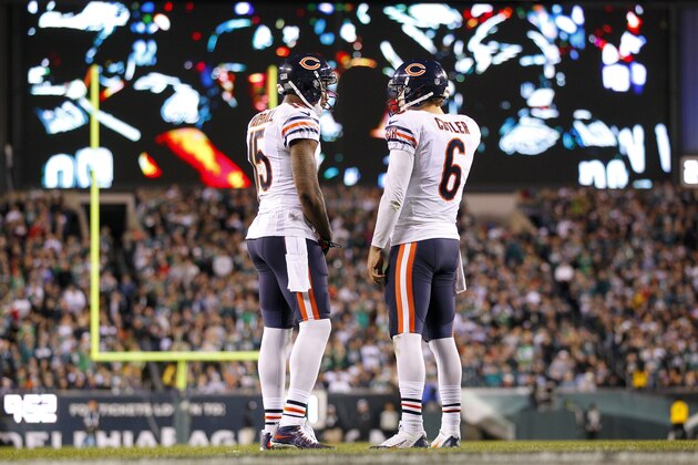 PHILADELPHIA, PA - DECEMBER 22: Wide receiver Brandon Marshall #15 and quarterback Jay Cutler #6 of the Chicago Bears talk during a timeout in the fourth quarter against the Philadelphia Eagles in a game at Lincoln Financial Field on December 22, 2013 in Philadelphia, Pennsylvania. The Eagles defeated the Bears 54-11. (Photo by Rich Schultz /Getty Images)