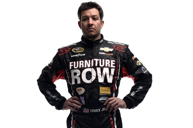 DAYTONA BEACH, FL - FEBRUARY 12:  Martin Truex Jr., driver of the #78 Furniture Row Chevrolet, poses for a portrait during the 2015 NASCAR Media Day at Daytona International Speedway on February 12, 2015 in Daytona Beach, Florida.  (Photo by Jared C. Tilton/Getty Images)