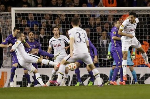 Tottenham Hotspur’s Roberto Soldado, left, scores a goal during the Europa League round of 32 soccer match between Tottenham and Fiorentina at White Hart Lane stadium in London, England, Thursday, Feb. 19, 2015.  (AP Photo/Tim Ireland)