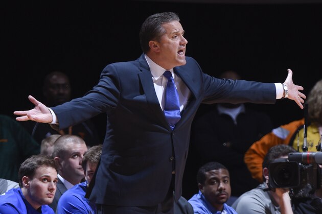 Kentucky head coach John Calipari screams at an official in the first half of an NCAA college basketball game Tuesday, Feb. 17, 2015, in Knoxville, Tenn. (AP Photo/Patrick Murphy-Racey)