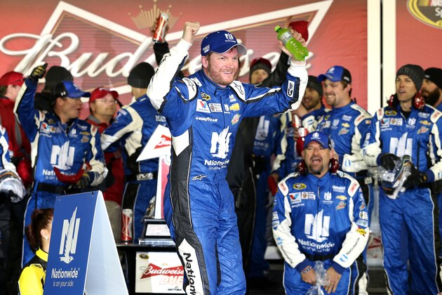 DAYTONA BEACH, FL - FEBRUARY 19:  Dale Earnhardt Jr., driver of the #88 Nationwide Chevrolet, celebrates in victory lane after winning the NASCAR Sprint Cup Series Budweiser Duel 1 at Daytona International Speedway on February 19, 2015 in Daytona Beach, Florida.  (Photo by Patrick Smith/Getty Images)