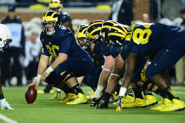 Oct 11, 2014; Ann Arbor, MI, USA; Michigan Wolverines offensive lineman Jack Miller (60) against the Penn State Nittany Lions at Michigan Stadium. Mandatory Credit: Andrew Weber-USA TODAY Sports