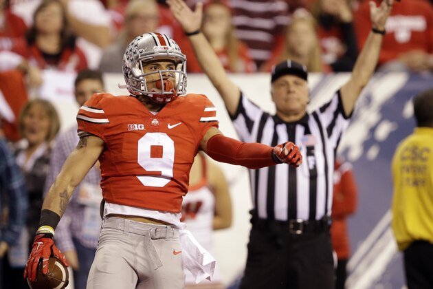 Ohio State wide receiver Devin Smith celebrates after catching a 44-yard touchdown pass during the first half of the Big Ten Conference championship NCAA college football game against Wisconsin Saturday, Dec. 6, 2014, in Indianapolis. (AP Photo/Darron Cummings)