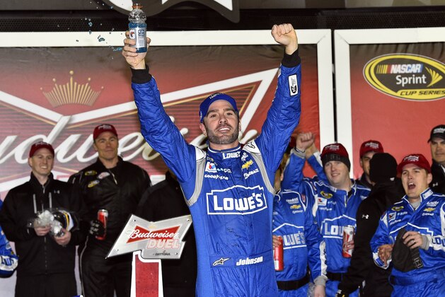 Feb 19, 2015; Daytona Beach, FL, USA; NASCAR Sprint Cup Series driver Jimmie Johnson (48) celebrates winning race two of the Budweiser Duels at Daytona International Speedway. Mandatory Credit: Jasen Vinlove-USA TODAY Sports