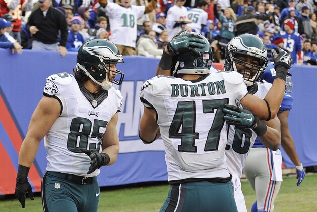 Philadelphia Eagles' Trey Burton (47) celebrates with teammates after returning a blocked punt for a touchdown during the second half of an NFL football game against the New York Giants, Sunday, Dec. 28, 2014, in East Rutherford, N.J. (AP Photo/Bill Kostroun)