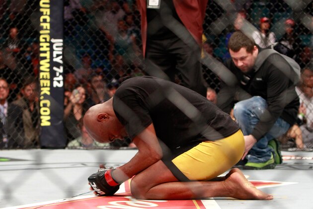 LAS VEGAS, NV - JANUARY 31:  Anderson Silva kneels on the mat after beating Nick Diaz in a middleweight bout during UFC 183 at the MGM Grand Garden Arena on January 31, 2015 in Las Vegas, Nevada. Silva won by unanimous decision.  (Photo by Steve Marcus/Getty Images)