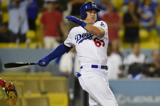 Los Angeles Dodgers Joc Pederson takes a swing in the ninth inning of a baseball game against the Washington Nationals, Monday, Sept. 1, 2014, in Los Angeles. The Nationals won 6-4. (AP Photo/Gus Ruelas)