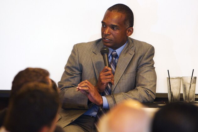 Miami football coach Randy Shannon, center,  talks to supporters at a noon time rally in Fort Lauderdale, Fla., on Tuesday, Sept. 7, 2010, about the upcoming NCAA college football game against Ohio State. (AP Photo/J Pat Carter)