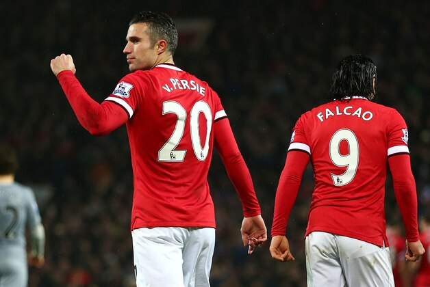 MANCHESTER, ENGLAND - DECEMBER 26:  Robin van Persie of Manchester United celebrates scoring the third goal  during the Barclays Premier League match between Manchester United and Newcastle United at Old Trafford on December 26, 2014 in Manchester, England.  (Photo by Clive Brunskill/Getty Images)