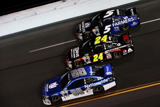 DAYTONA BEACH, FL - FEBRUARY 19:  Dale Earnhardt Jr., driver of the #88 Nationwide Chevrolet, Jeff Gordon, driver of the #24 Drive To End Hunger Chevrolet, and Kasey Kahne, driver of the #5 Farmers Insurance Chevrolet, race during the NASCAR Sprint Cup Series Budweiser Duel 1 at Daytona International Speedway on February 19, 2015 in Daytona Beach, Florida.  (Photo by Brian Lawdermilk/Getty Images)