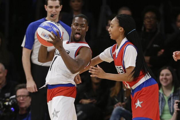 Mo'ne Davis, right, defends Kevin Hart during the first half of the NBA All-Star celebrity basketball game Friday, Feb. 13, 2015, in New York. (AP Photo/Frank Franklin II)