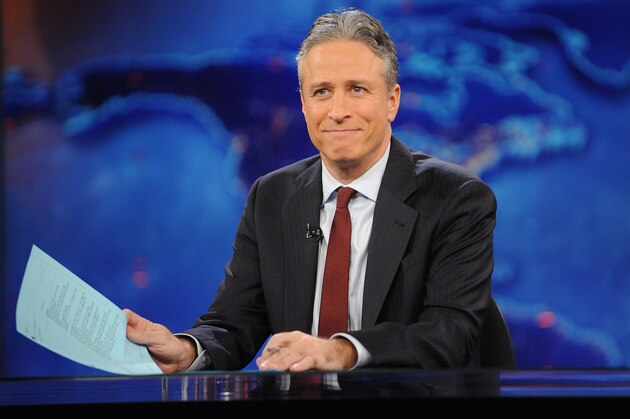 FILE - This Nov. 30, 2011 file photo shows television host Jon Stewart during a taping of