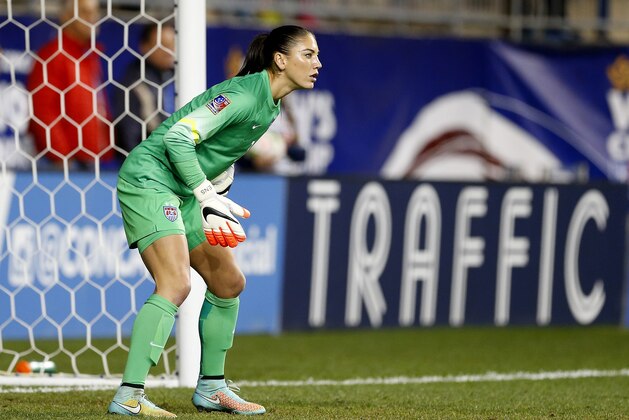 United States goalkeeper Hope Solo (1) in action against Mexico in the second half during a CONCACAF semifinal soccer match in Chester, Pa., Friday, Oct. 24, 2014. The United States defeated Mexico 3-0. (AP Photo/Rich Schultz)