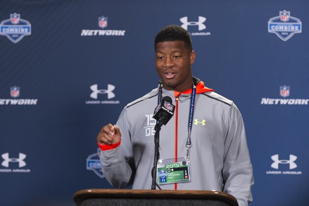 Florida State quarterback Jameis Winston talks with the media during a news conference at the NFL football scouting combine at Lucas Oil Stadium in Indianapolis, Friday, Feb. 20, 2015. (AP Photo/Doug McSchooler)