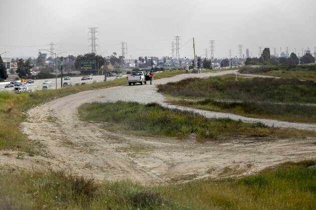 The site for a proposed NFL football stadium by the owners of the San Diego Chargers and Oakland Raiders, is seen in Carson, Calif., on Friday, Feb. 20, 2015. The new NFL football stadium would be built on a 168-acre site at the southwest quadrant of the intersection of the 405 Freeway, seen left, and Del Amo Blvd. The Oakland Raiders and San Diego Chargers are planning a shared stadium in the Los Angeles area if both teams fail to get new stadium deals in their current hometowns, the teams said in a joint statement, adding another layer of complexity to a possible NFL return to the region. (AP Photo/Damian Dovarganes)