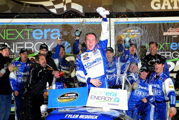 DAYTONA BEACH, FL - FEBRUARY 20:  Tyler Reddick, driver of the #19 DrawTite Ford, celebrates in victory lane after winning the NASCAR Camping World Truck Series NextEra Energy Resources 250 at Daytona International Speedway on February 20, 2015 in Daytona Beach, Florida.  (Photo by Robert Laberge/Getty Images)